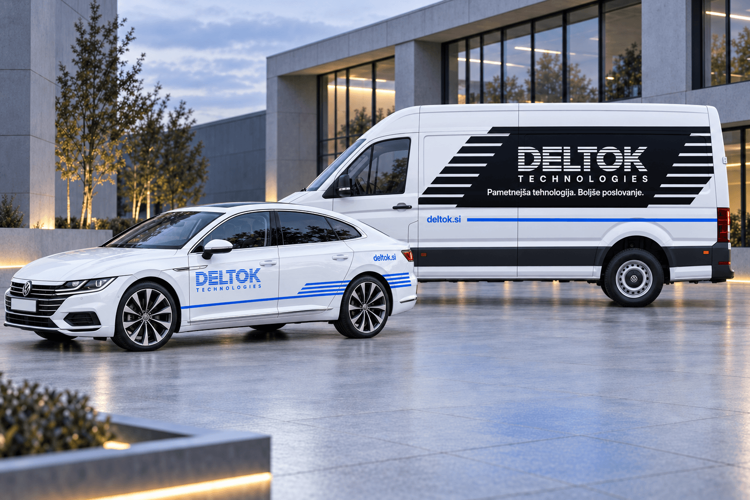 Auto und Transporter mit Deltok-Technologies-Beschriftung vor einem Bürogebäude